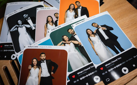 MusicGram-Booth photo booth prints on a table